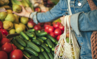 Close-up of ecologically friendly reusable bag with fruit and vegetables