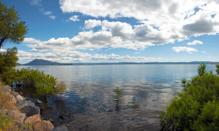 A photo of clearlake with a cloudy sky in the background