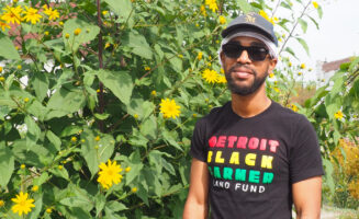 Jøn Kent poses for a photo at Sanctuary Farms in Detroit