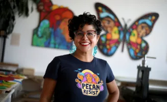 Favianna Rodriguez poses for a photograph at her studio
