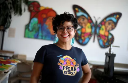 Favianna Rodriguez poses for a photograph at her studio