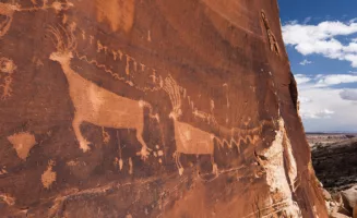 “The Procession Panel” in Bears Ears National Monument is 15 feet tall and more than 1,000 years old. Carved by Ancestral Puebloans, the petroglyphs act as maps and monuments for Indigenous peoples who are working to steward these lands once again.