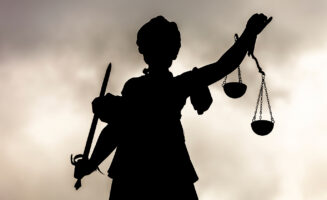Silhouette of the Lady Justice statue