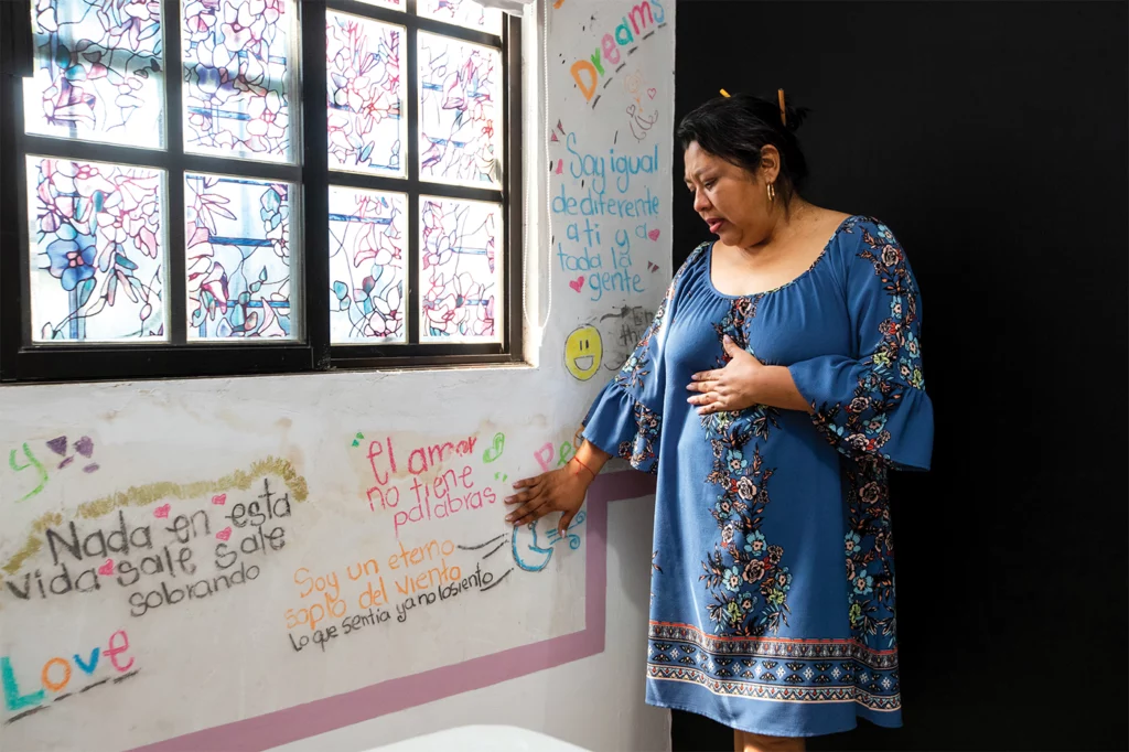 Pérez touches the wall of Milynali’s bedroom in their home in Tamuín, San Luis Potosí. Her daughter decorated the wall with colorful messages before she disappeared: “Love has no words.” “I am an eternal breath of wind. What I felt I no longer feel.” “Nothing in this life is superfluous.” “I am just as different from you as from all people.”