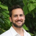 Kevin Young, a white man with facial hair, smiles