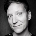 Lindsey Danis is a white queer person with a short haircut