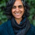 Michelle Mascarenhas, an Indian woman, smiles at the camera