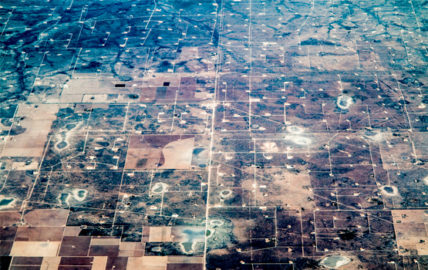 West Texas fracking wells. Photo by Dennis Dimick