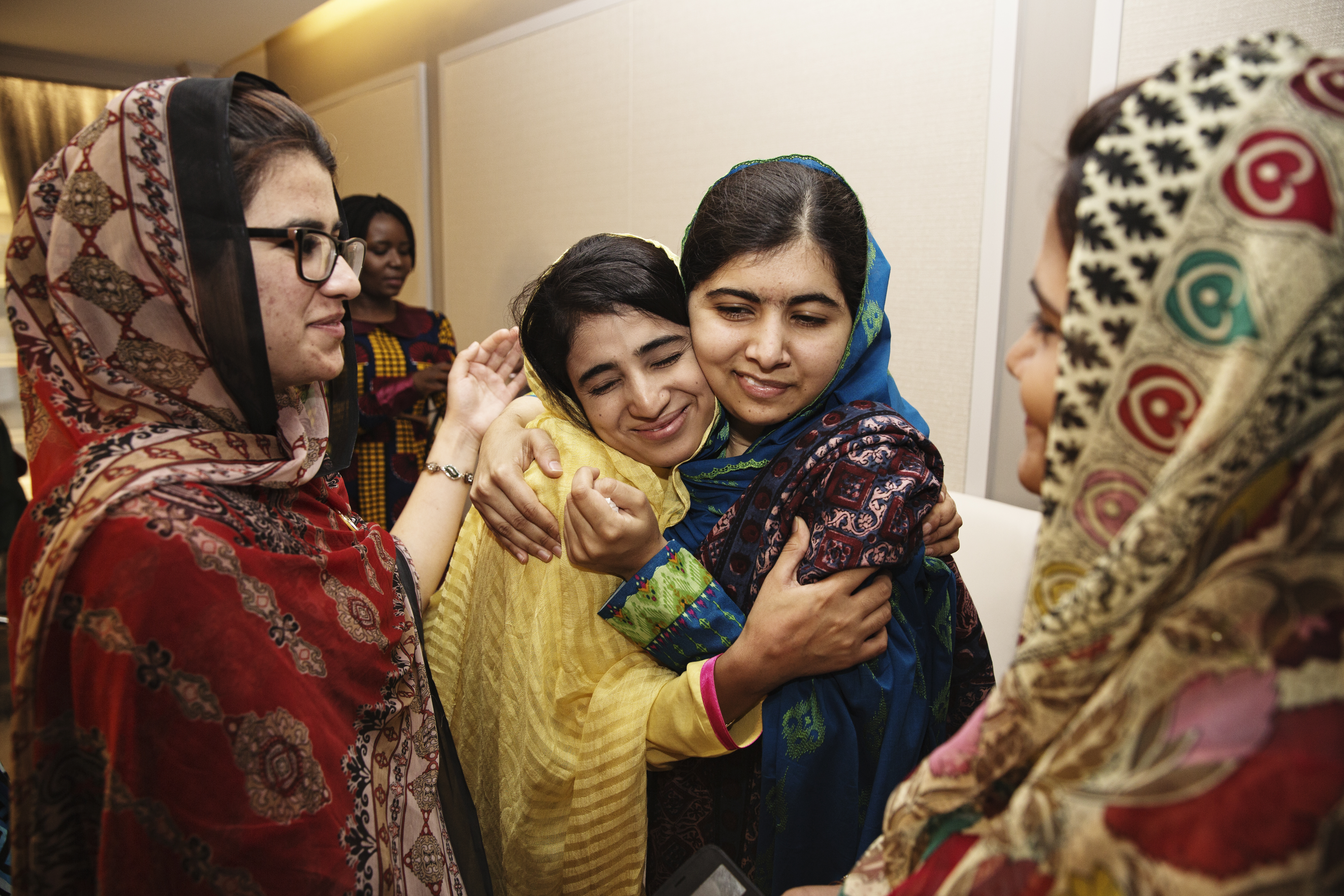 Shazia & Kainat hug Malala.jpg