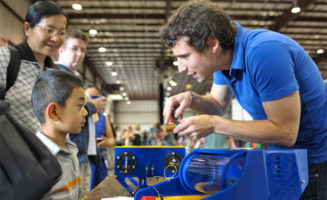 Eric Stackpole demonstrates an open-source underwater robot.