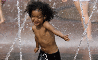 A child plays at the Christian Science Plaza in Boston