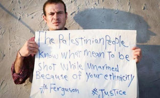 Palestinian in support of Ferguson protestors.