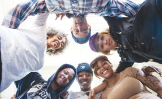 Fania Davis with students from Ralph Bunche High School