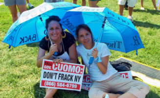 Fracking opponents on the grass.