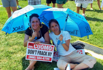 Fracking opponents on the grass.
