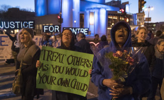 Maria Hamilton (far right) on the one year anniversary of Dontre's death.