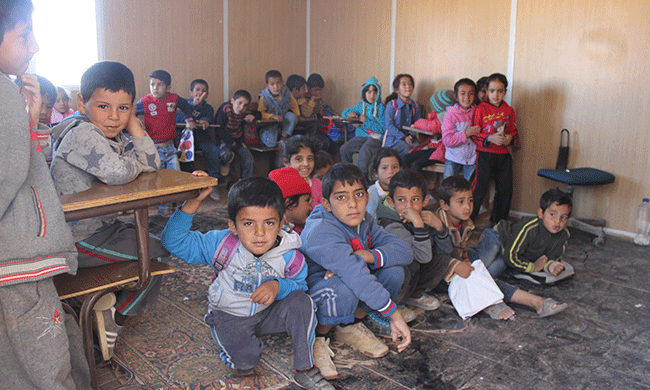 How to Educate a Generation of Syrian Refugees? Makeshift Classrooms and the Teacher Next Door