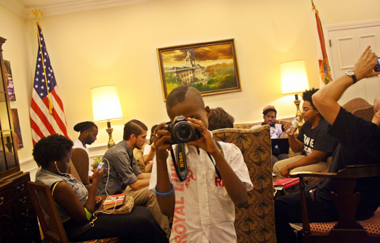 Young occupier plays with camera