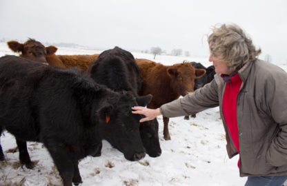 Jennifer "Tootie" Jones visits the beef cattle she raises at Swift Level Farm in West Virginia