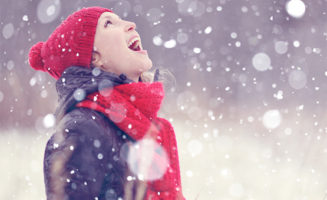 Woman in snow by Shutterstock