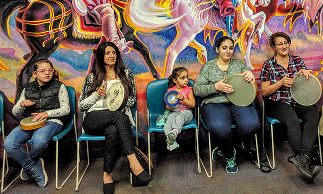 Amid Travel Ban, Refugee Women Cope With Trauma and Stress Through Drum Circles